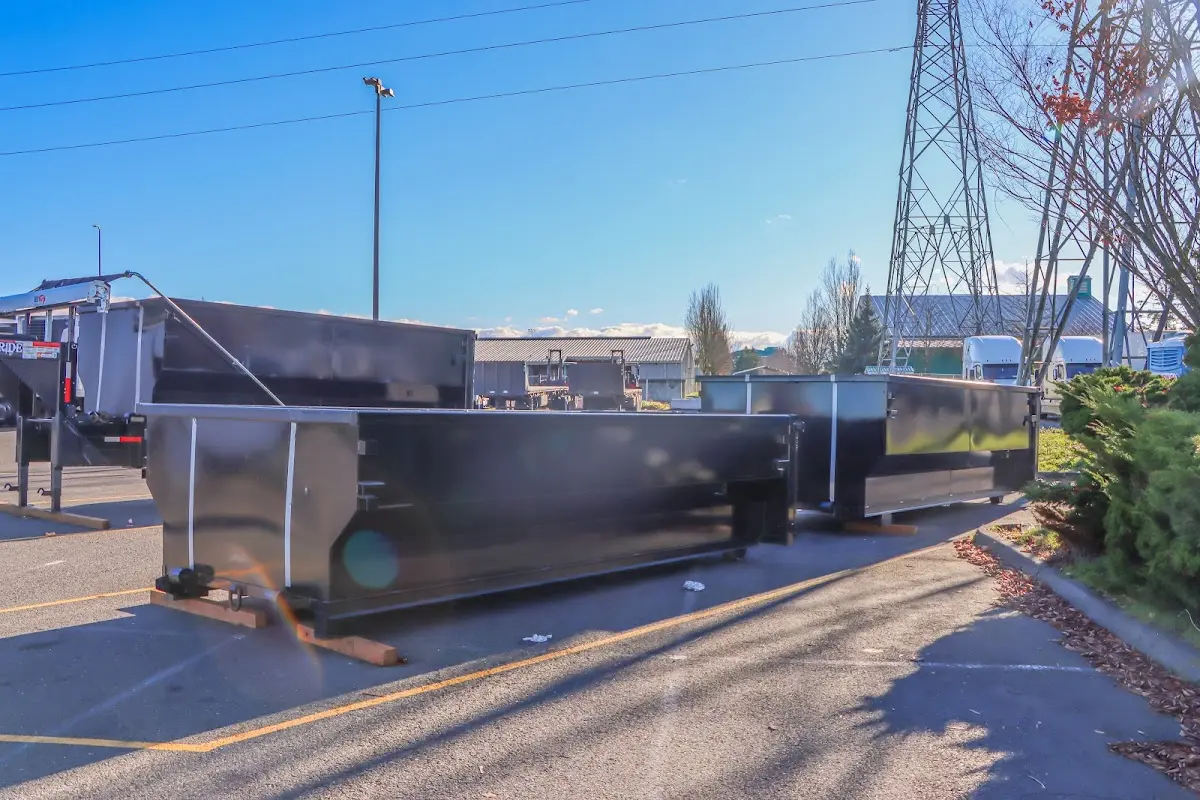 Roll-off dumpster ready for waste disposal at job site for Yard Waste Dumpster Rental in Columbia Heights